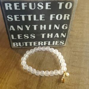 Clear, Eiffel tower and pearl bracelet